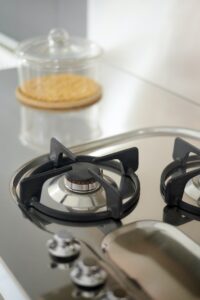 Detail of a gas kitchen in stainless steel
